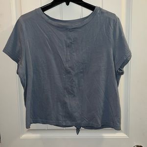 Dip blue crop top with tie in back. No stains or holes
